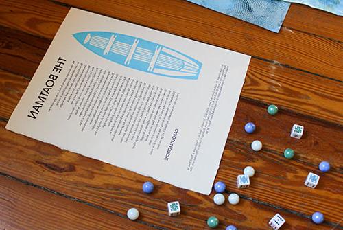 The Boatman broadside on table with mables and dice